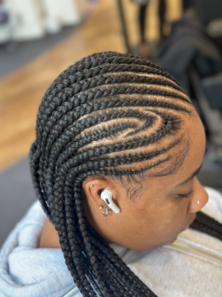 Detailed cornrow design with laid edges