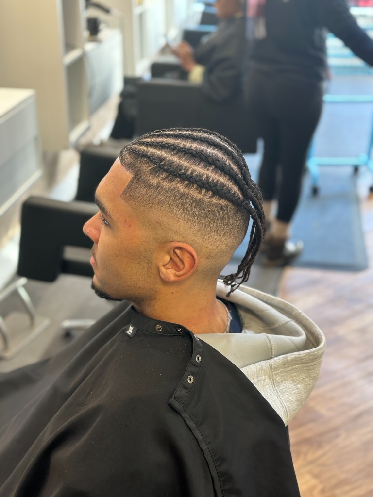 Cornrows and fade finished in the chair