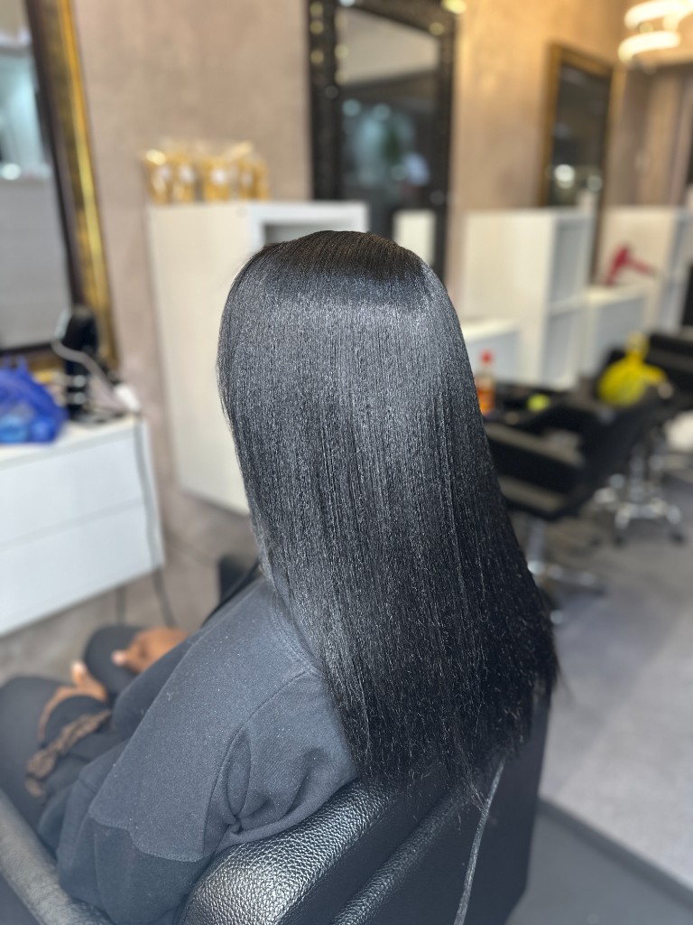 Silk press finish with glossy straight hair